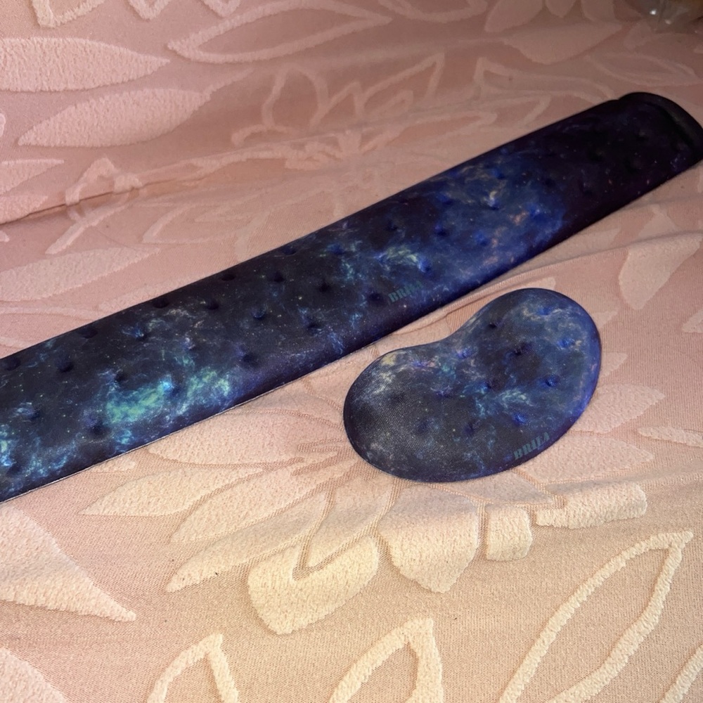 Galaxy print wrist cushions